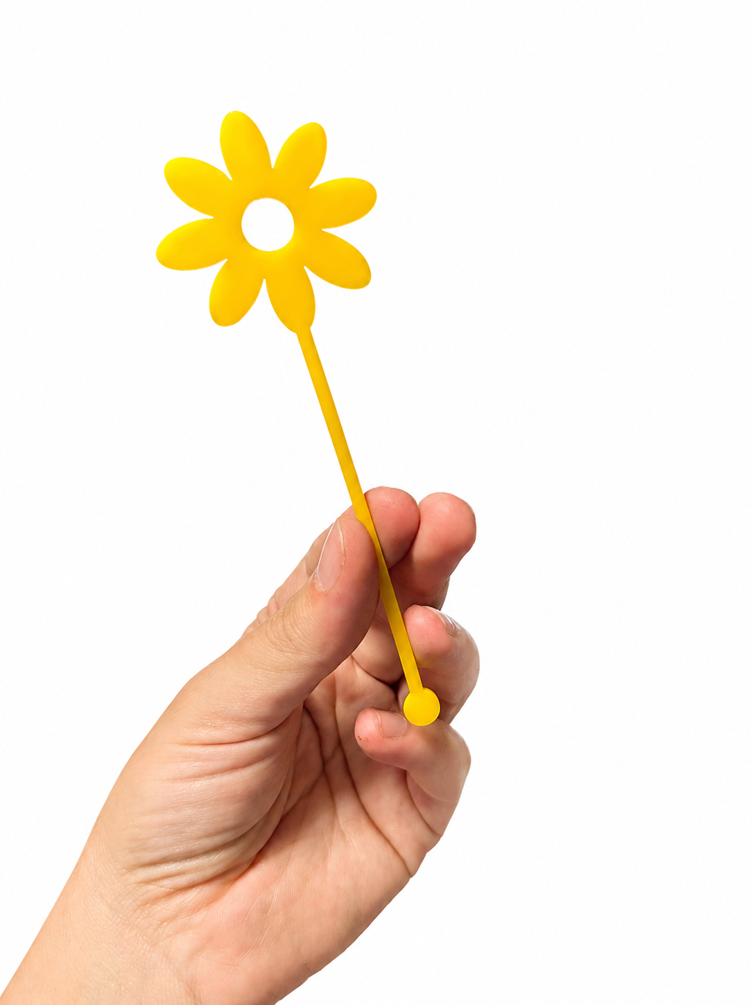 Pink and yellow flower shaped drink stirrers