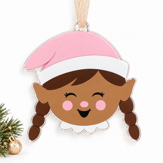 girl elf UV printed acrylic Christmas ornament in Tone 3 on a studio background, with sheer beige ribbon.