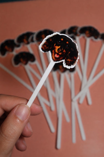 Custom dog face drink stirrers on white sticks