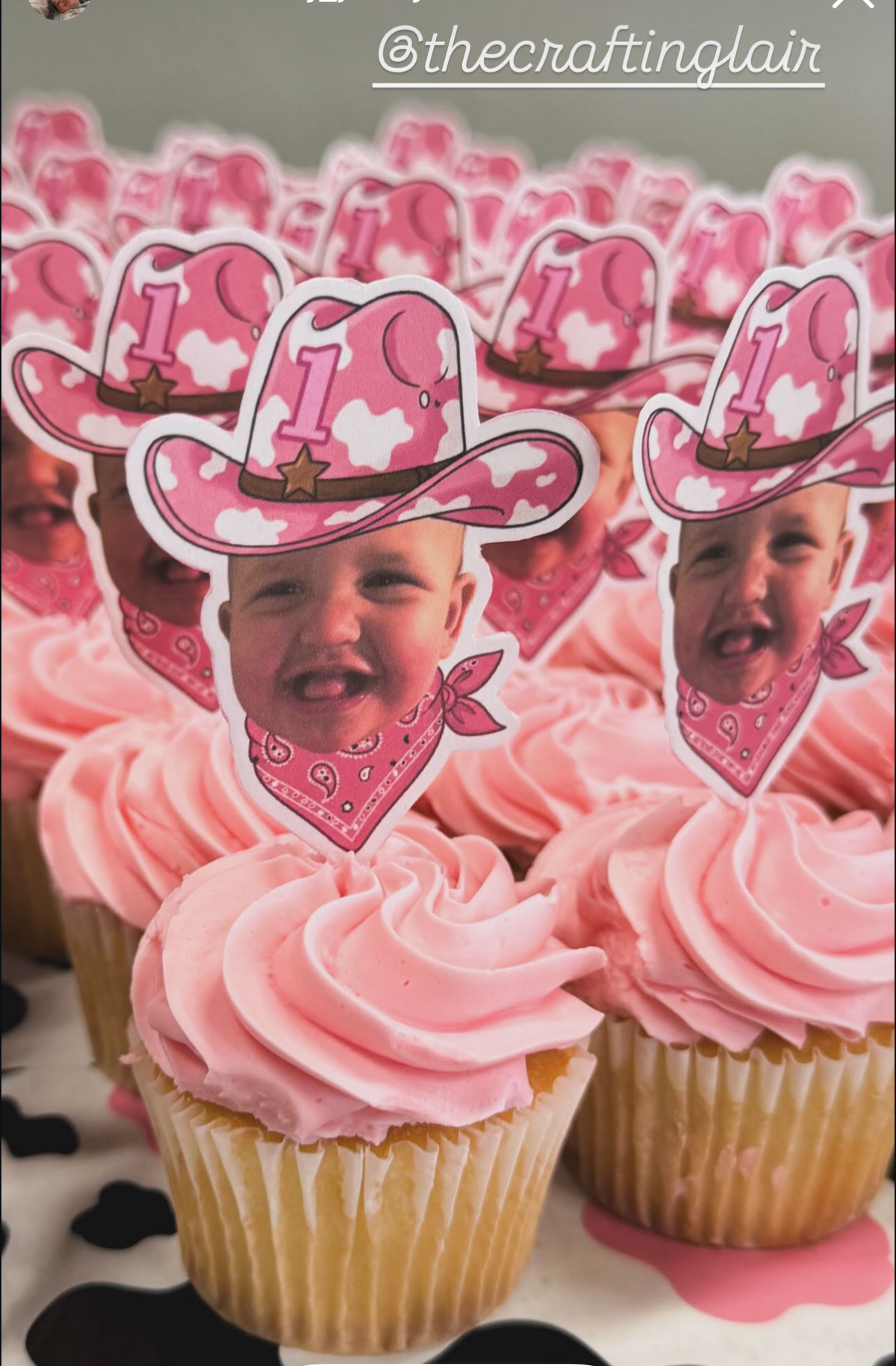 A social media story featuring a collection of pink frosted cupcakes decorated with cowboy hat and bandana face cutouts, displayed on a phone screen mockup.