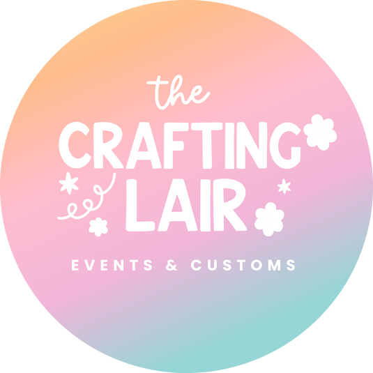 The Crafting Lair circular logo in pastel colors