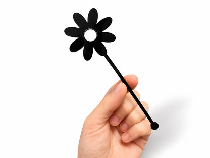 Pink and yellow flower shaped drink stirrers