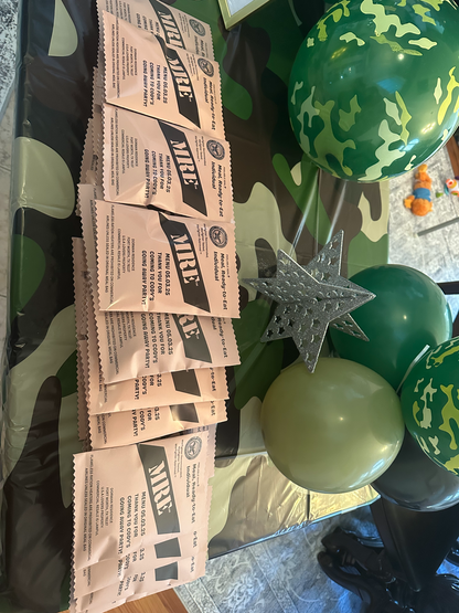 Custom snack favor bags arranged on a themed party table