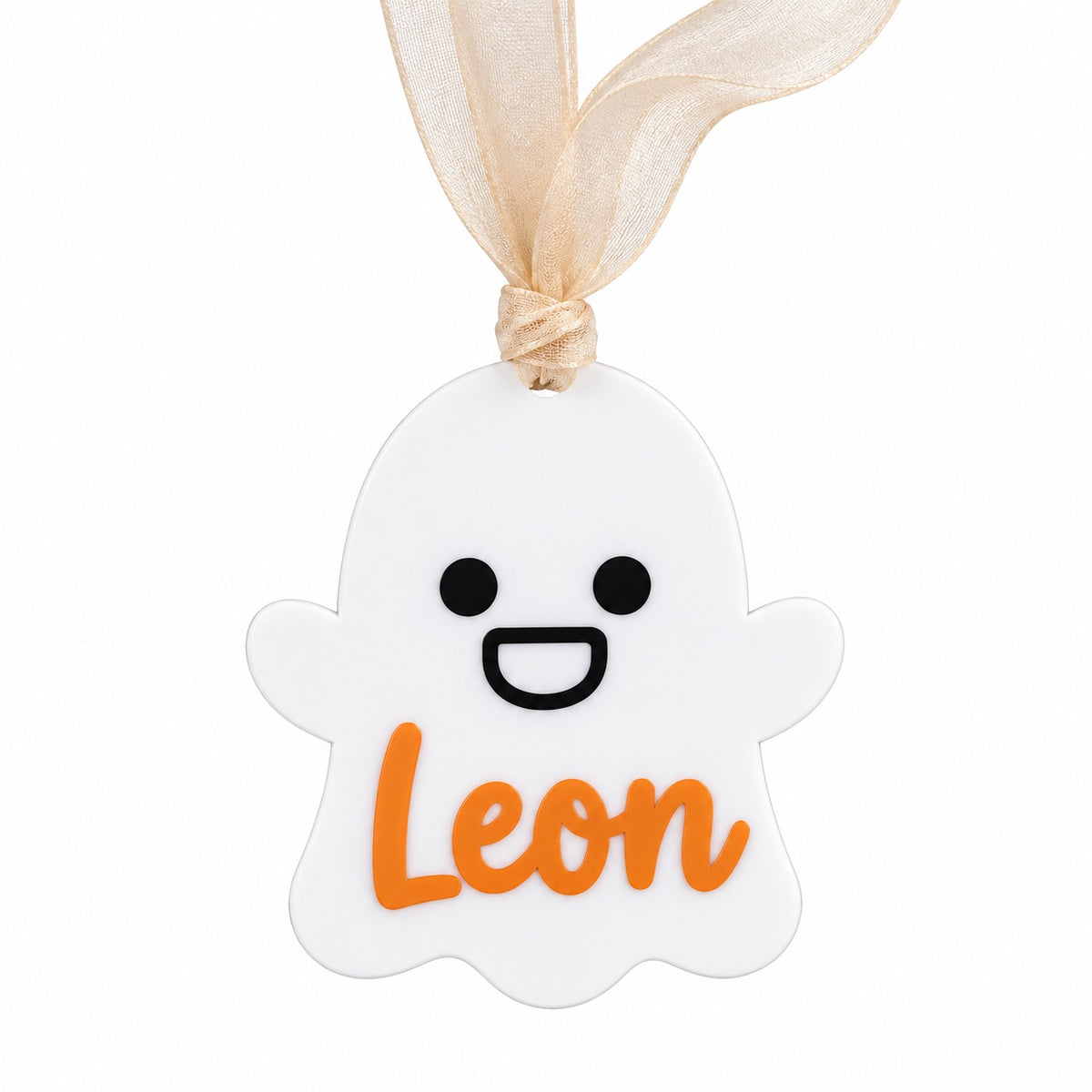 White personalized Halloween ghost hanger with orange Leon lettering and beige ribbon, front view.
