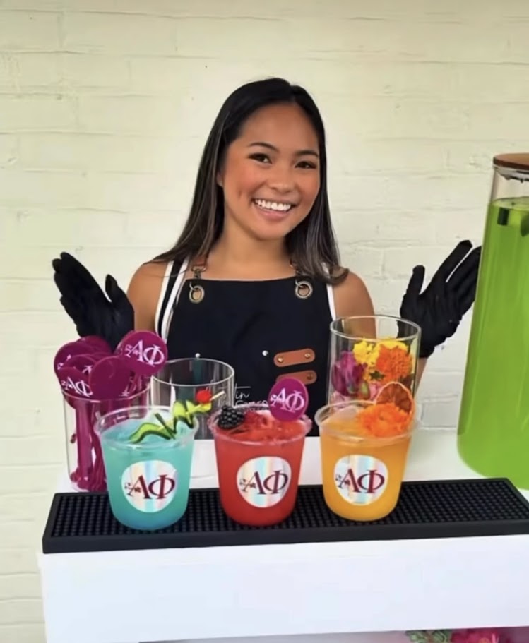 Custom holographic logo stickers displayed on colorful party drink cups