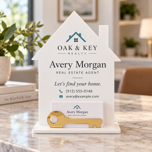 White house shaped acrylic realtor information display with teal branding, sample contact details, and a gold mirror acrylic key business card holder. Design mockup.