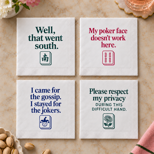 Four mahjong napkin designs with South wind, bamboo, joker and chrysanthemum tile illustrations and humorous sayings.