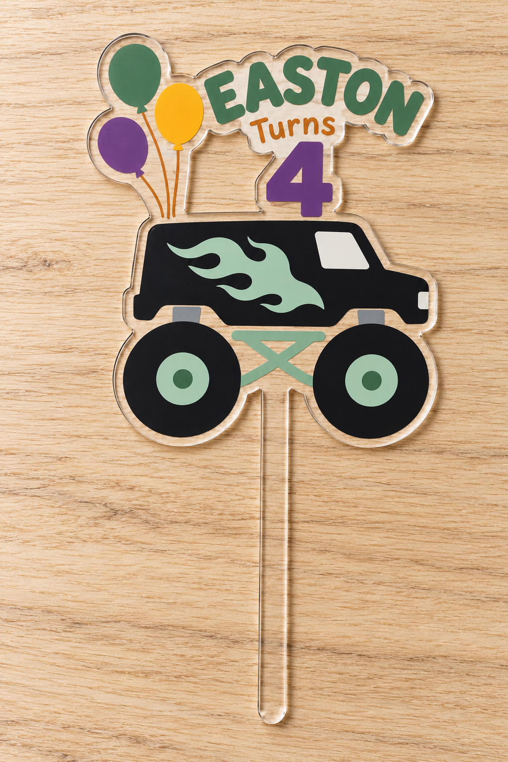 Personalized black and mint flame monster truck cake topper with Easton name and age 4