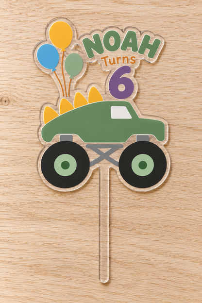 Personalized green dinosaur monster truck birthday cake topper with custom name and age on clear acrylic