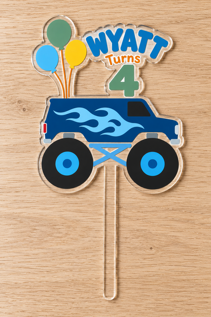 Personalized navy blue flames monster truck birthday cake topper with custom name and age on clear acrylic