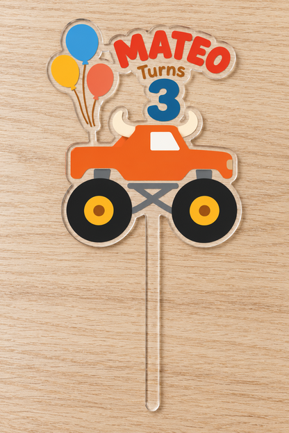 Personalized orange bull monster truck birthday cake topper with custom name and age on clear acrylic