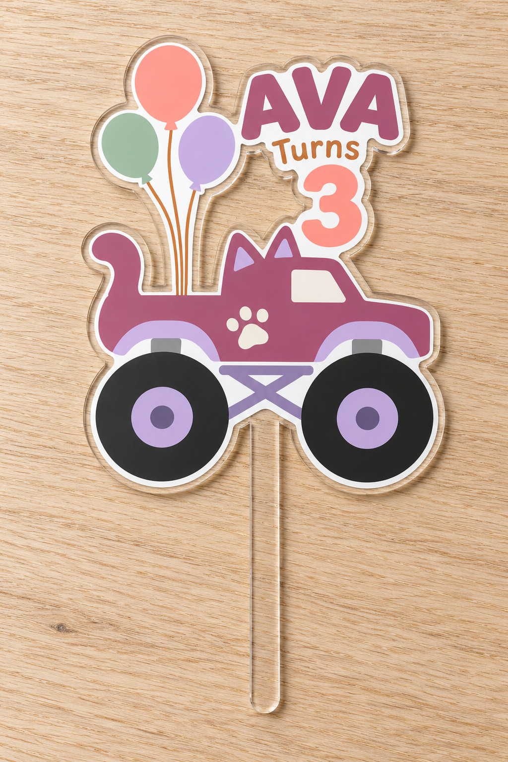 Personalized purple cat monster truck birthday cake topper with custom name and age on clear acrylic