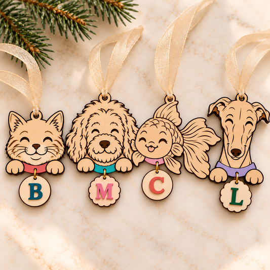 Cat, goldendoodle, flowing-tail fish and greyhound wooden ornaments with painted collars, round and scalloped initial tags