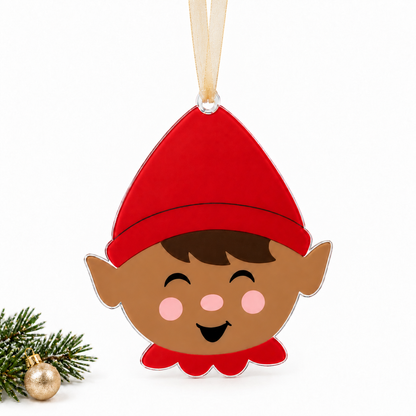 boy elf UV printed acrylic Christmas ornament in Tone 3 on a studio background, with sheer beige ribbon.