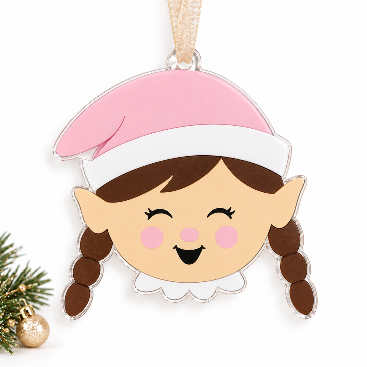 girl elf UV printed acrylic Christmas ornament in Tone 1 on a studio background, with sheer beige ribbon.