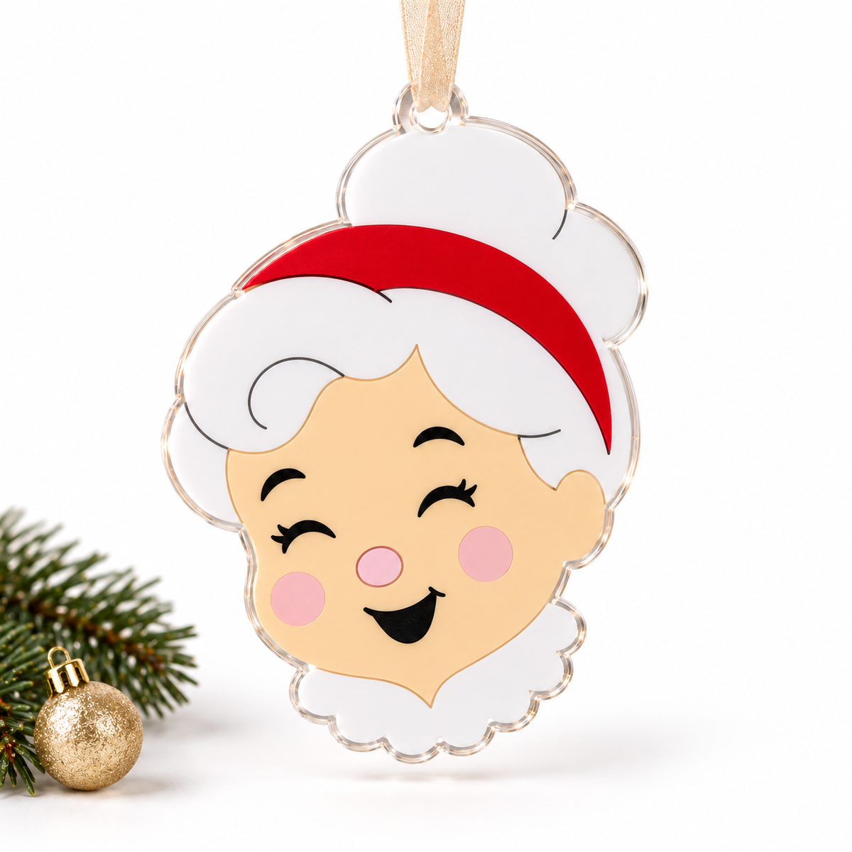 mrs claus UV printed acrylic Christmas ornament in Tone 1 on a studio background, with sheer beige ribbon.