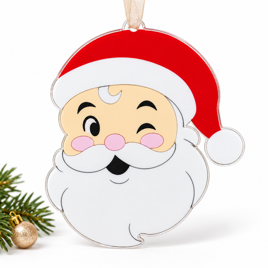 santa UV printed acrylic Christmas ornament in Tone 1 on a studio background, with sheer beige ribbon.