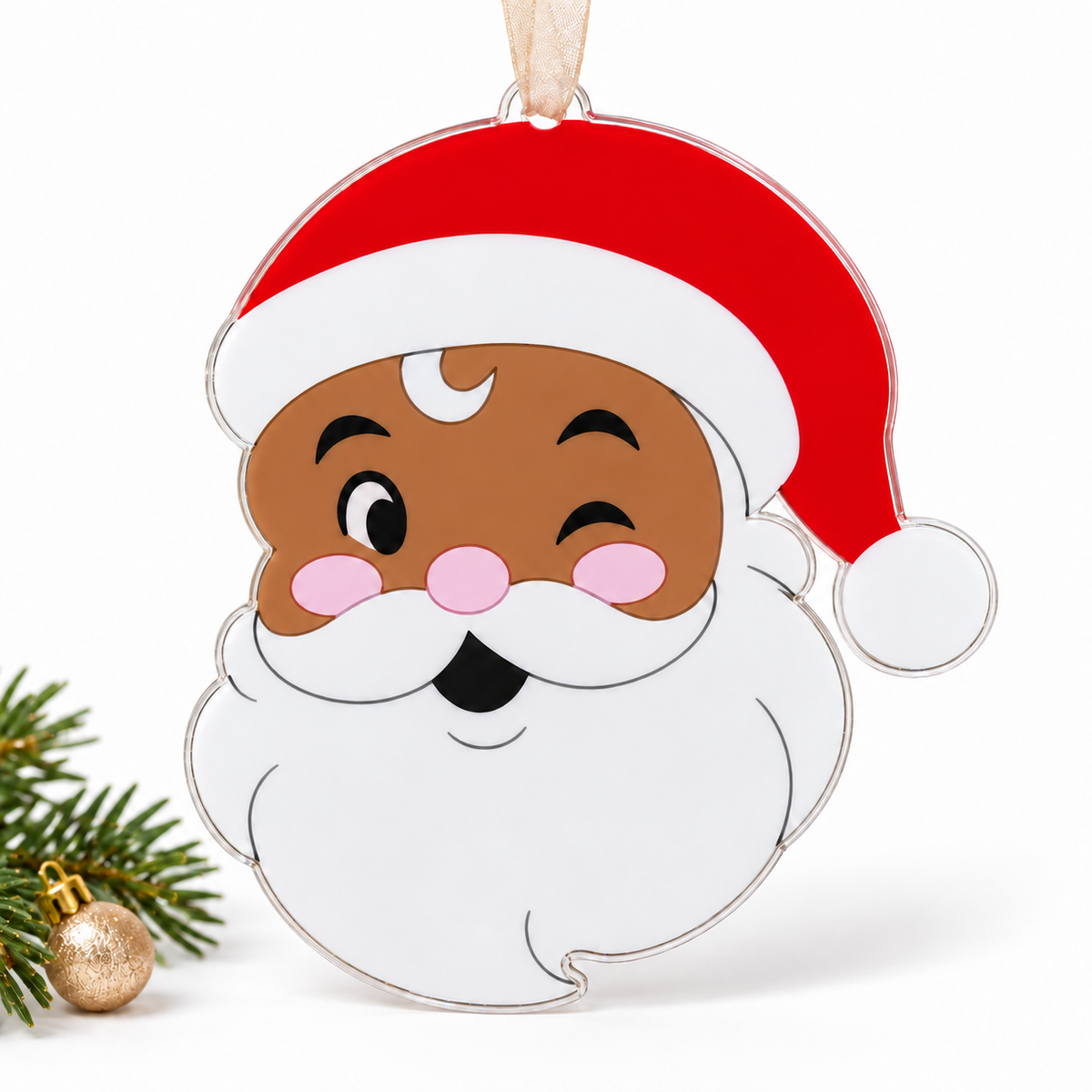 santa UV printed acrylic Christmas ornament in Tone 3 on a studio background, with sheer beige ribbon.